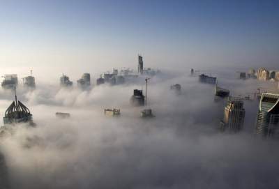 Головокружительные и завораживающие фотографии: города в облаках. Фото